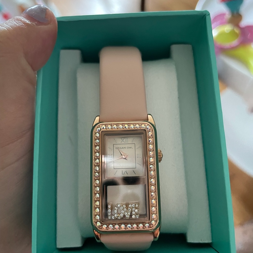 Storyteller Rose gold living locket watch